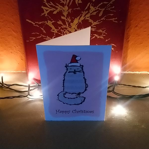 The Tatty Cat character is born out of an embroidery gone wrong & features in these Christmas cards for the alternative cat-obsessed celebrator of Christmas. Each pack contains four different designs on smooth matt 300gsm card, with white envelopes. Blank inside.