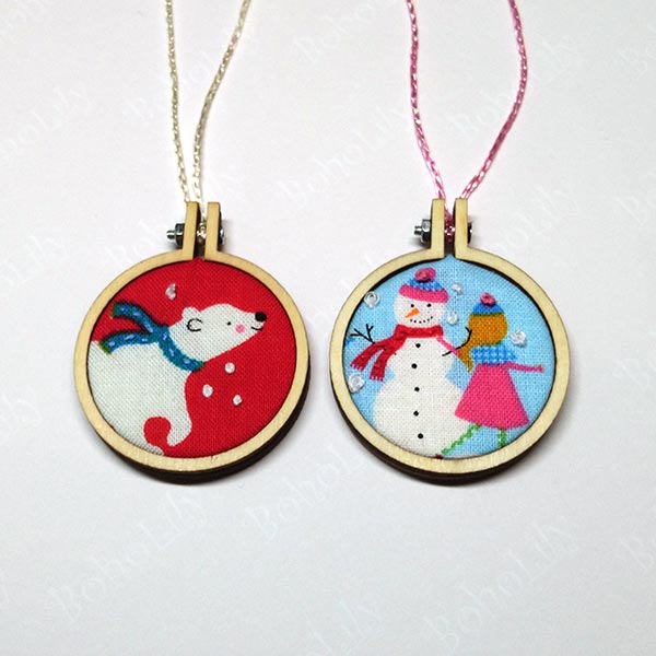 A pair of cute mini hoops in an even cuter hand-made Santa sack.
