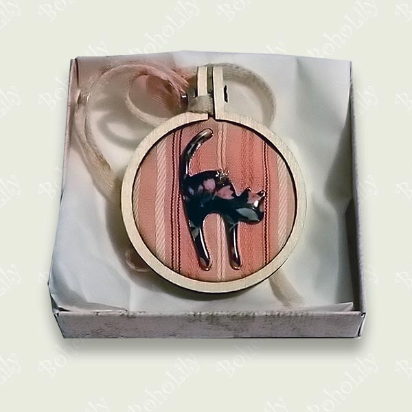 A black and floral cat charm stitched onto pink striped recycled fabric.  Supplied with contrasting fabric yarn hanging loop and a lovely handmade gift box.