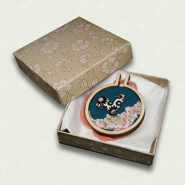 This quirky cockerel charm has been hand stitched using DMC metallic thread onto a dark teal fabric background with a recycled appliqued foreground. It is ready to hang with the contrasting cotton yarn.  This item is supplied in a beautiful handmade gift box making it an ideal and unique present. Only one available These mini hoops make ideal Christmas stocking fillers.