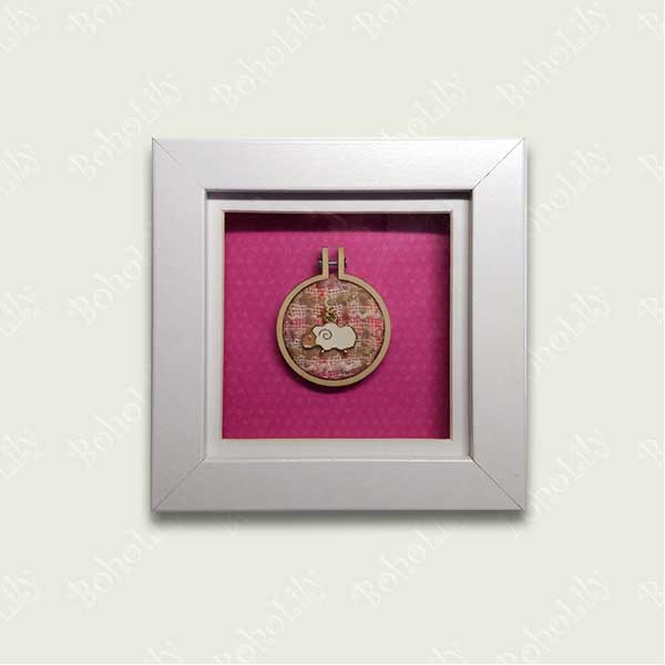 Sheep charm stitched onto recycled fabric using DMC metallic thread in mini embroidery hoop. Mounted onto pink background and framed in a shadow box frame. Freestanding or wall hanging  Only one available. 